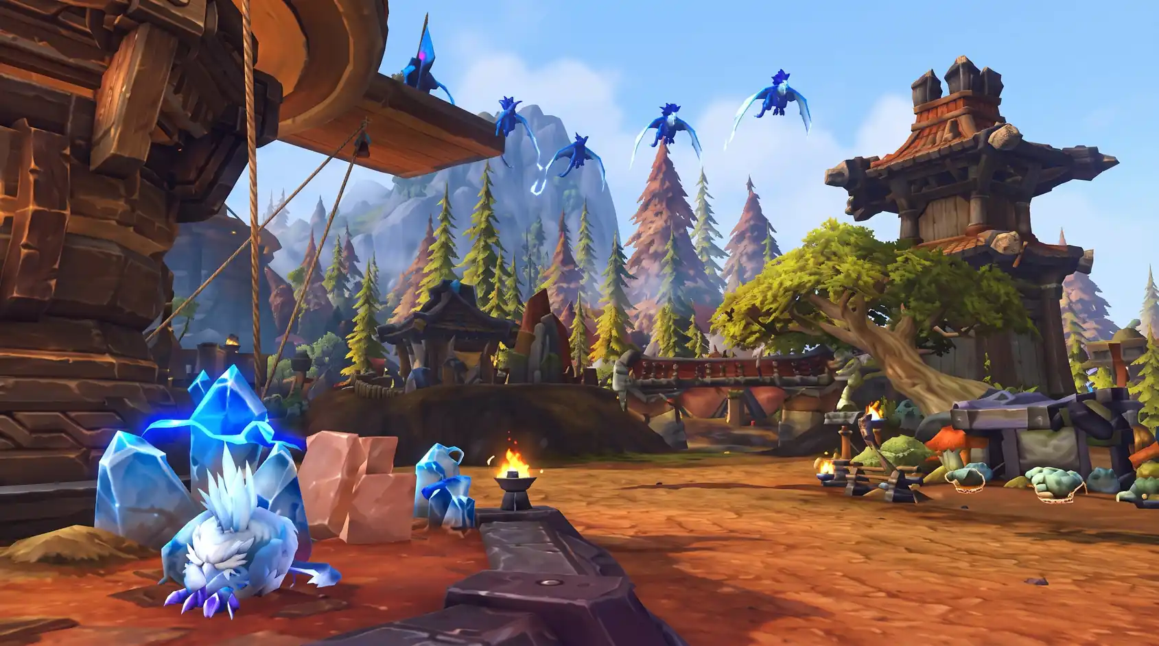 Blue creatures and crystals in a settlement shown in the Housing Endeavors preview
